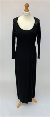 Lot 2804 - A black long sleeved floor length silk evening...