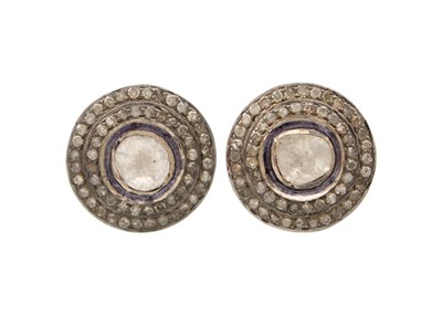 Lot 126 - A pair of round silver Polka diamond halo stud earrings.