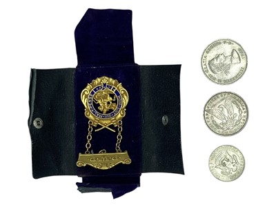 Lot 207 - A Masonic P.W.P. gold-plated jewel, a USA 1889 Morgan silver dollar and two other coins.