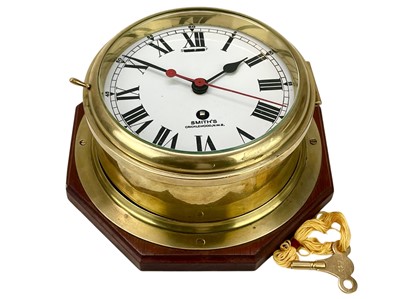 Lot 472 - A Smith's brass bulkhead wall timepiece.