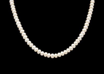 Lot 138 - A string of white cultured freshwater pearls on a 9k gold lobster clasp.
