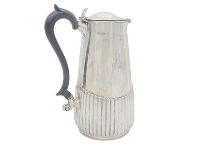 Lot 25 - A George V silver half-fluted hot water pot by Manoah Rhodes & Sons Ltd.