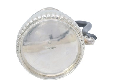 Lot 25 - A George V silver half-fluted hot water pot by Manoah Rhodes & Sons Ltd.