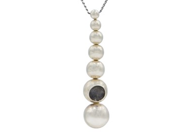 Lot 60 - Georg Jensen's 'Cave' pendant necklace in an original box.