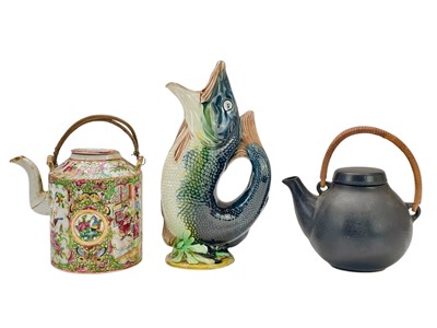 Lot 319 - A Canton Famille Rose teapot.