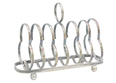 Lot 38 - An Edwardian silver six-section toast rack by James Deakin & Sons.