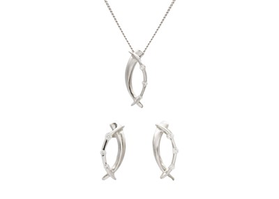 Lot 142 - A set of 9K white gold and diamond pendant necklace with a pair of matching earrings.