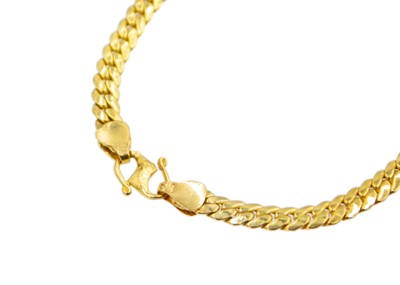 Lot 52 - A high-purity gold curb chain bracelet.