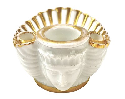 Lot 345 - An English porcelain shell-shaped inkwell/quill holder.