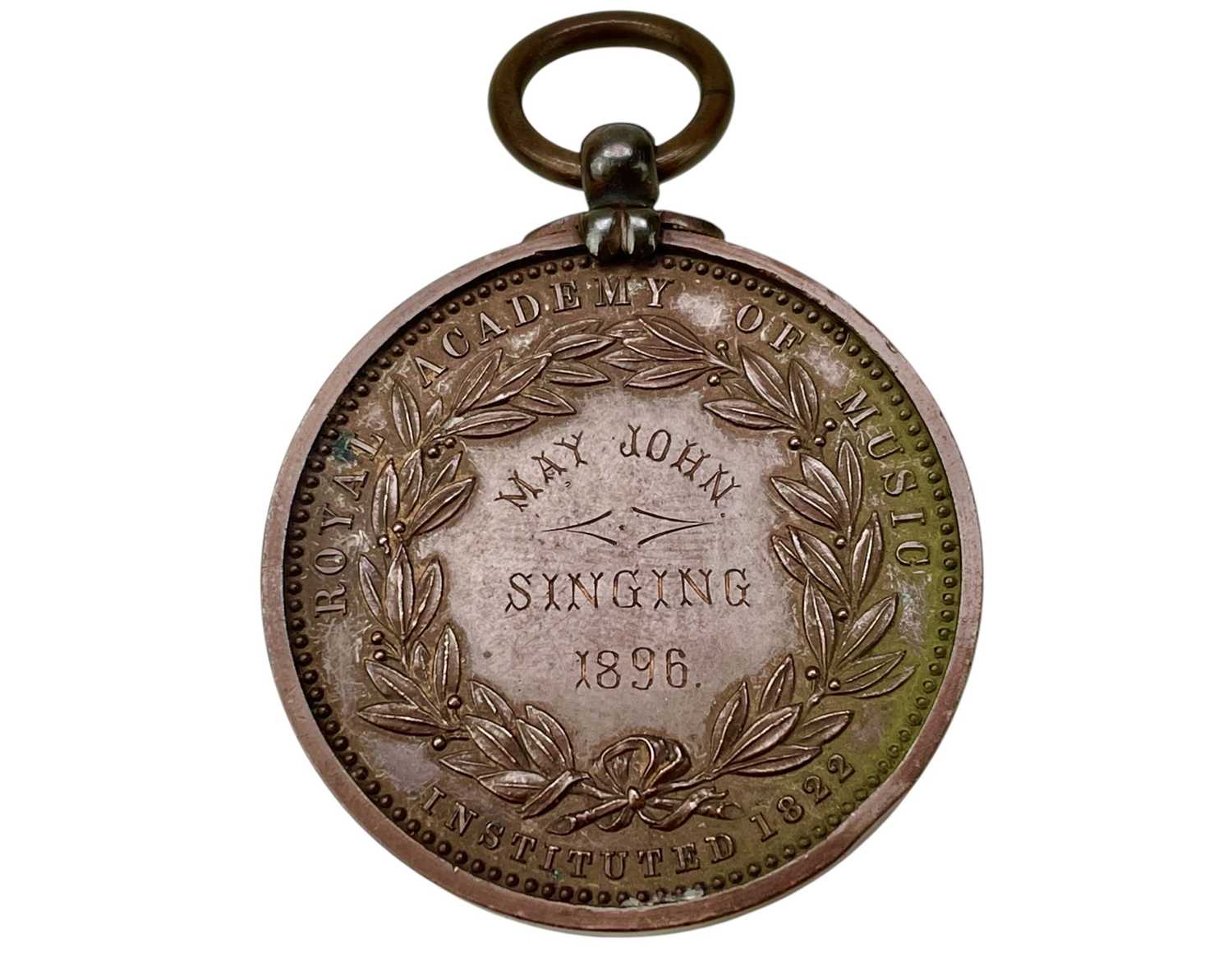 Lot 4 - A Royal Academy of Music bronze medal awarded to May John, 1896.
