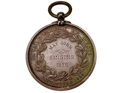 Lot 4 - A Royal Academy of Music bronze medal awarded to May John, 1896.