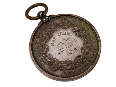 Lot 4 - A Royal Academy of Music bronze medal awarded to May John, 1896.
