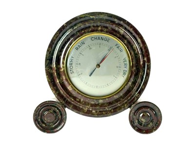Lot 233 - A Cornish Serpentine circular desk barometer.