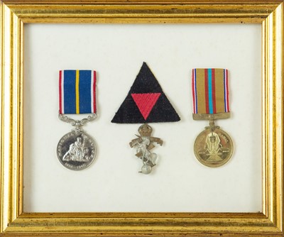 Lot 213 - A Suez Canal medal and a National Service medal 1939-1960.