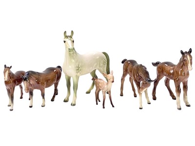 Lot 349 - Four Beswick horse figures.