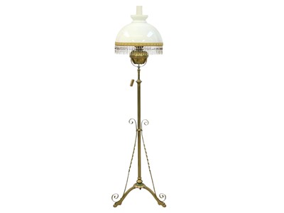 Lot 840a - A Victorian brass adjustable standard lamp.