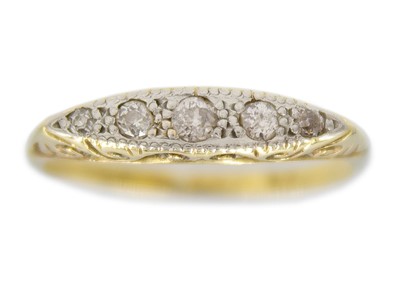 Lot 69 - An antique yellow gold and platinum boat-shaped five-stone diamond set ring.