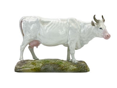 Lot 331 - A Continental porcelain figure of a cow.