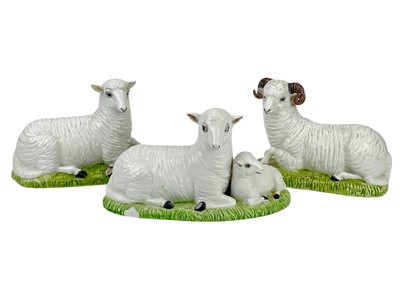 Lot 348 - A pair of Italian pottery figures of a ewe and a ram.