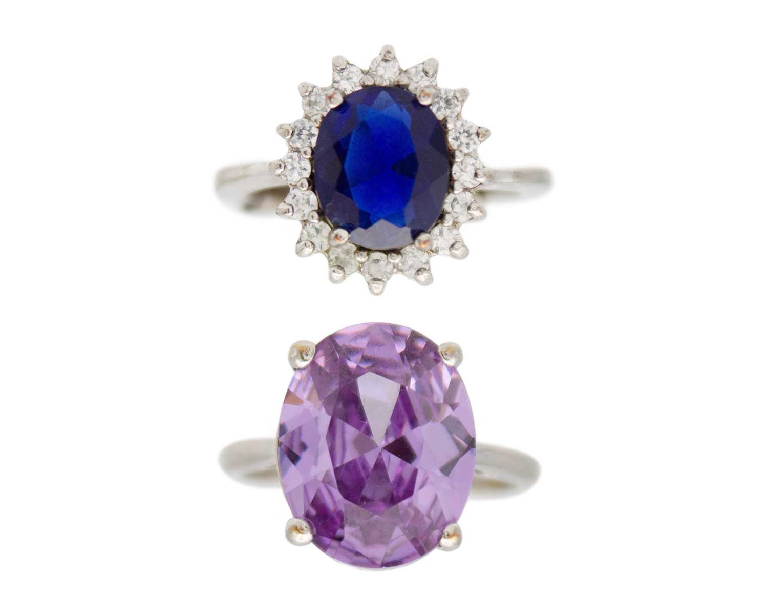 Lot 23 - Two M&S white metal gem rings.