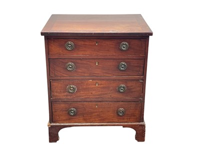 Lot 526 - A mahogany small chest of drawers.