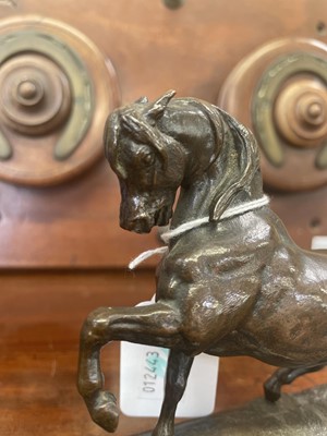 Lot 19 - After Antoine Louis Barye, a bronze figure of a horse.