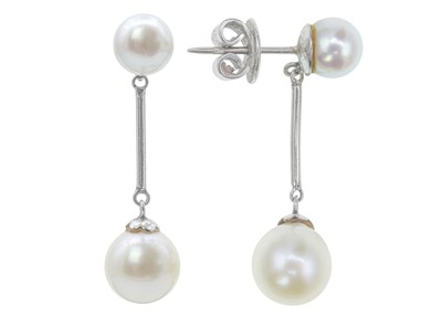 Lot 64 - A pair of 14k white gold cultured pearl pendant earrings.