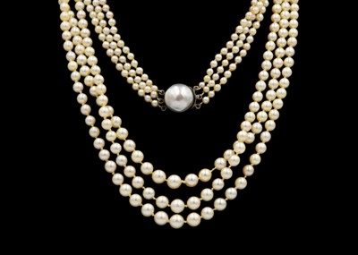 Lot 65 - A set of white cultured pearl necklace and a matched bracelet.