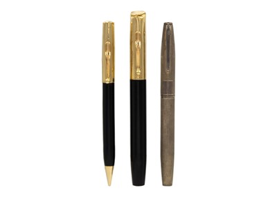 Lot 78 - CARTIER- A gold lidded Cartier pen and pencil, together with a silver pen.