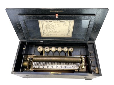 Lot 5 - A Swiss rosewood, inlaid, and ebonised cylinder music box.