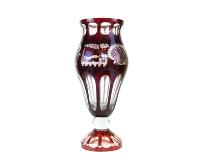 Lot 329 - A bohemian cut glass vase with ruby overlay.