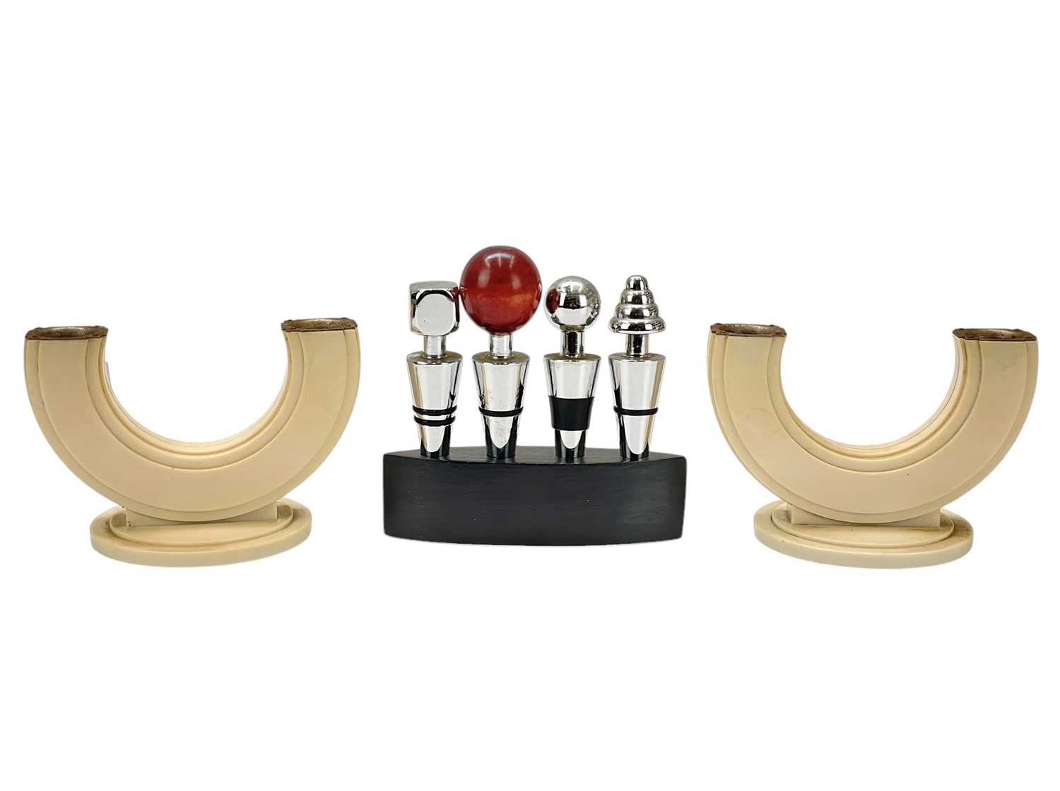 Lot 30 - A pair of Art Deco Bakelite twin branch candelabra.