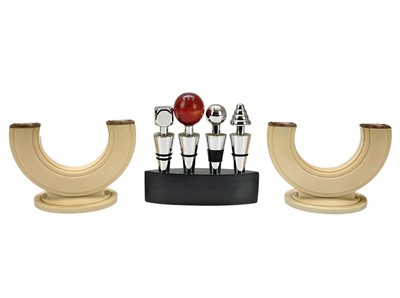 Lot 30 - A pair of Art Deco Bakelite twin branch candelabra.