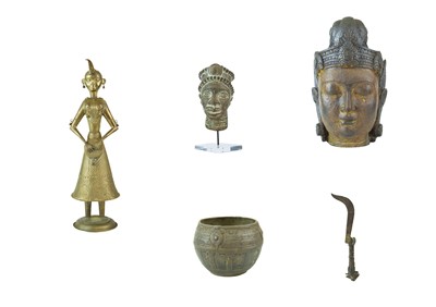 Lot 417 - An Indian brass statue of a female musician.