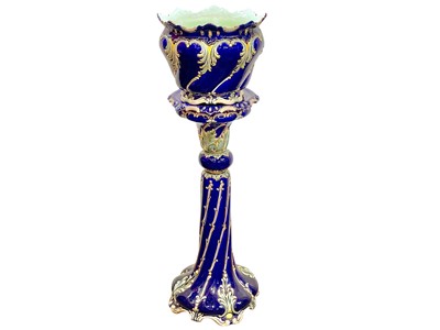 Lot 341 - A continental jardiniere and matching stand.
