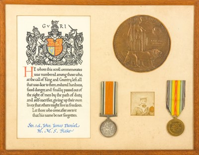 Lot 152 - A WWI naval casualty pair and plaque.