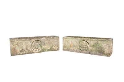 Lot 375 - A pair of composition stone garden planters of rectangular form.