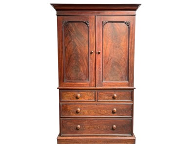 Lot 512 - A Victorian mahogany linen press.