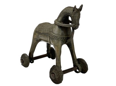 Lot 16 - A Burmese bronze sculpture of a horse and rider.