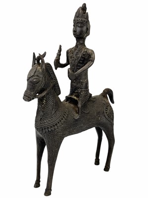 Lot 16 - A Burmese bronze sculpture of a horse and rider.