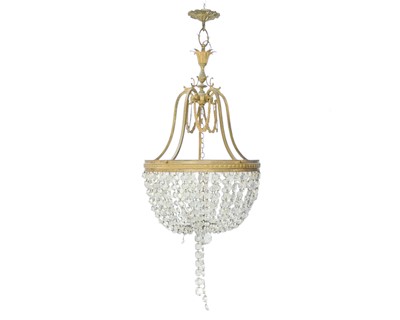 Lot 844a - A gilt metal and cut glass bag chandelier.