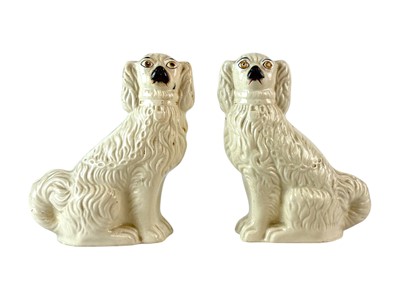 Lot 336 - A pair of Victorian Staffordshire spaniels.