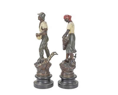 Lot 6 - A pair of French spelter figures of agricultural workers.