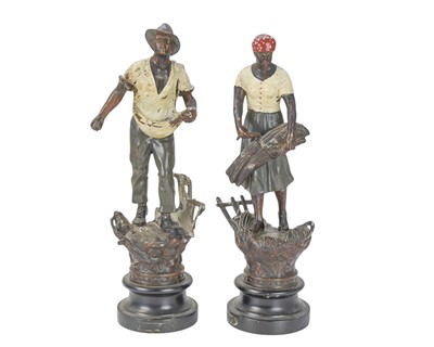 Lot 6 - A pair of French spelter figures of agricultural workers.