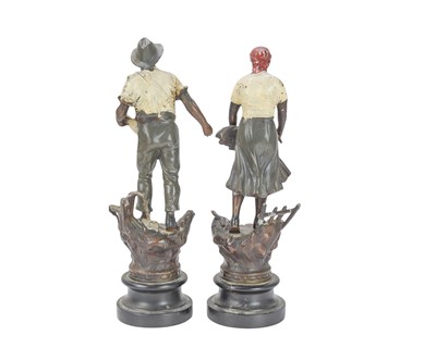 Lot 6 - A pair of French spelter figures of agricultural workers.