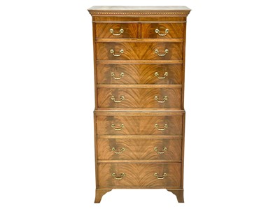 Lot 502 - A Georgian style mahogany chest on chest of small proportions.
