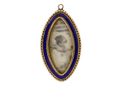 Lot 104 - A Georgian high-purity gold with blue enamel memorial pendant.