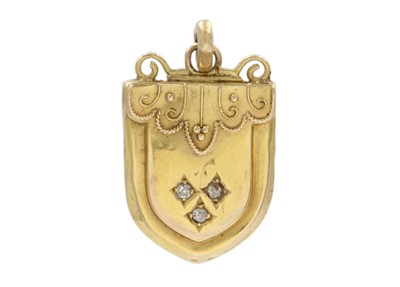 Lot 106 - A Victorian high purity gold and diamonds Etruscan style memorial pendant.