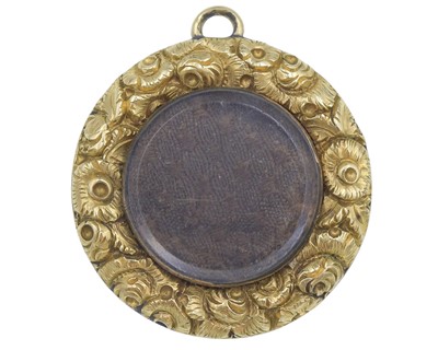 Lot 105 - An early 19th-century high-purity gold locket pendant.