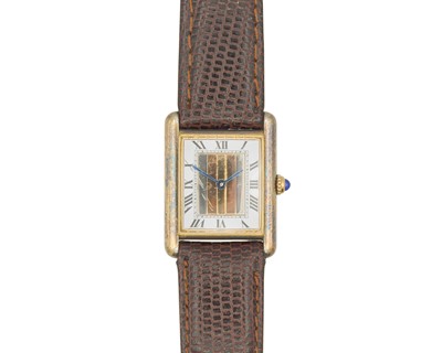 Lot 1080 - MUST DE CARTIER - A Vermeil Tank 'Trinity' silver-gilt gentleman's quartz dress wristwatch.